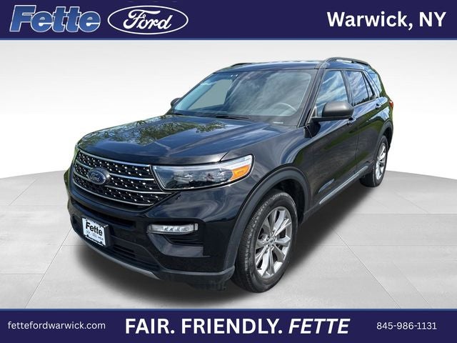2023 Ford Explorer XLT in Agate Black Metallic — front three-quarter view