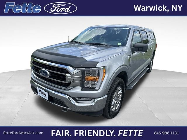 2021 Ford F-150 XLT in Iconic Silver Metallic — front three-quarter view