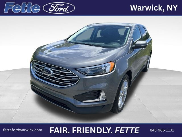 2024 Ford Edge Titanium in Carbonized Gray Metallic — front three-quarter view