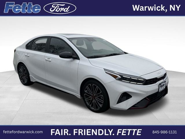 2024 Kia Forte GT in Snow White Pearl — front three-quarter view